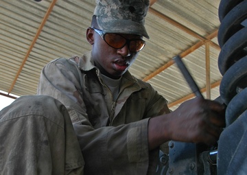 'Like a Pit Crew,' Mechanics Keep Batteries Firing