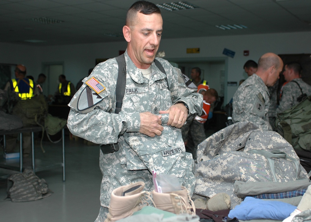 MEDEVAC finishes packing their helicopters, bags