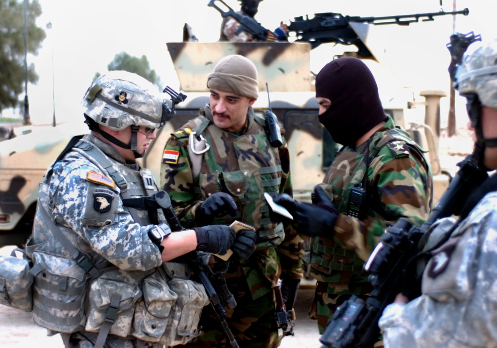 Iraqi Army Leads Raids