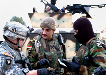 Iraqi Army Leads Raids