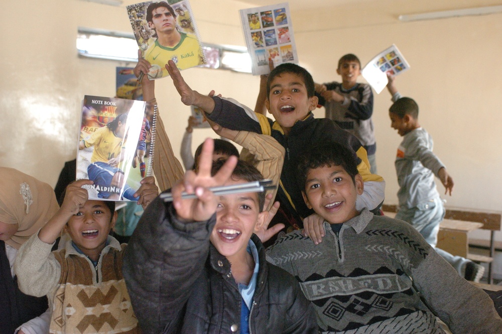 Children receive school supplies