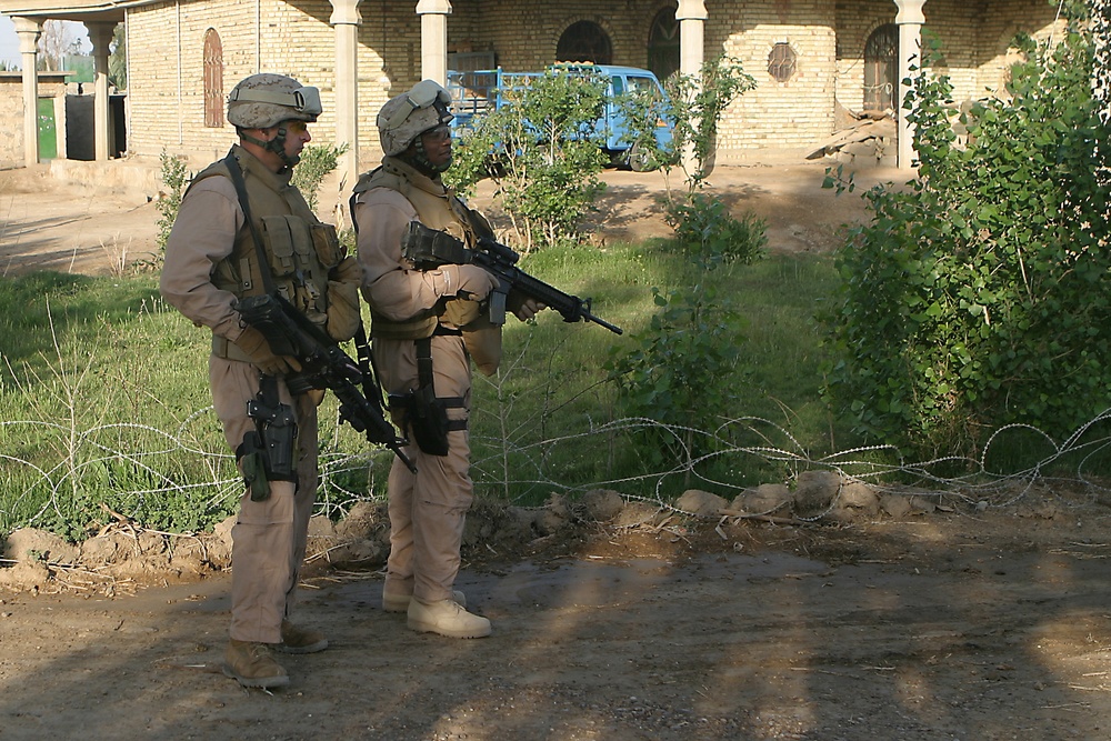 Service members in Al Fahren, Iraq
