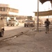 U.S. Army and Iraqi soldiers patrol side by side