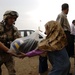 Civil military cooperation officisl visit Iraqi elementary school