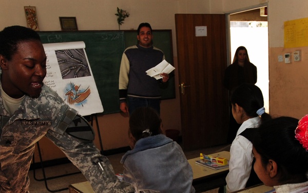 Black Jack Soldiers show Salhiyah children how to stay healthy