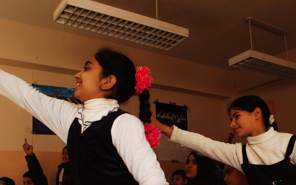 Black Jack Soldiers show Salhiyah children how to stay healthy