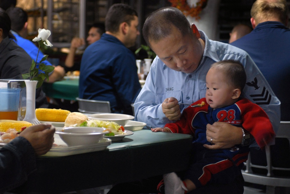 Petty Officer Enjoys Thanksgiving with son