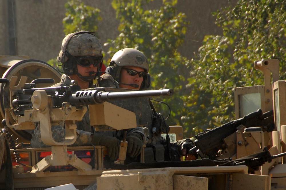 Cavalry troops patrol Ameriyah