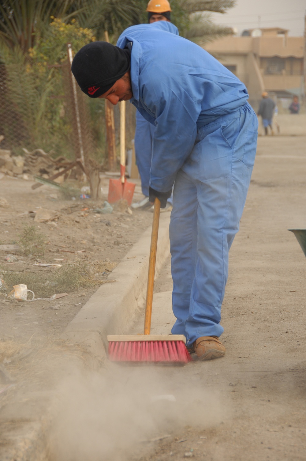 Local nationals hired to clean up streets in Gazaliyah