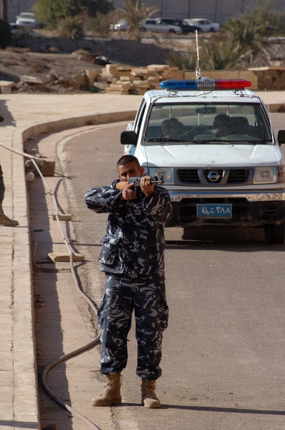 Military Policemen, Civilian Officers Teach Tactics to Tikrit Police