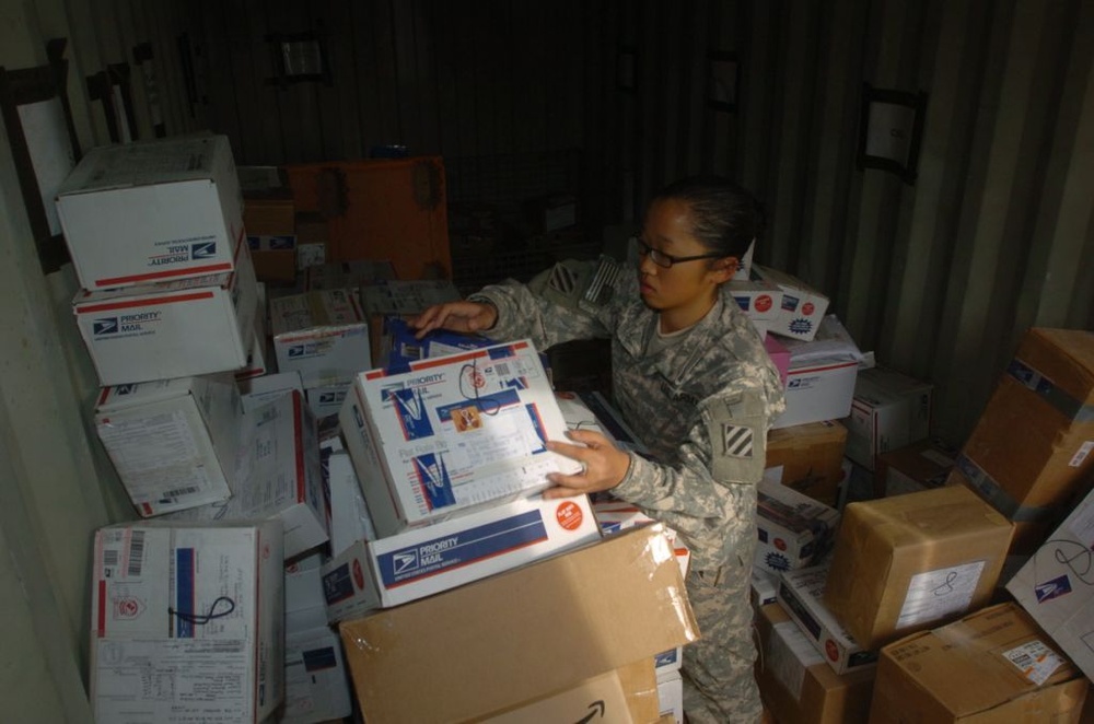 Mail handlers in overdrive to get Christmas packages to Soldiers