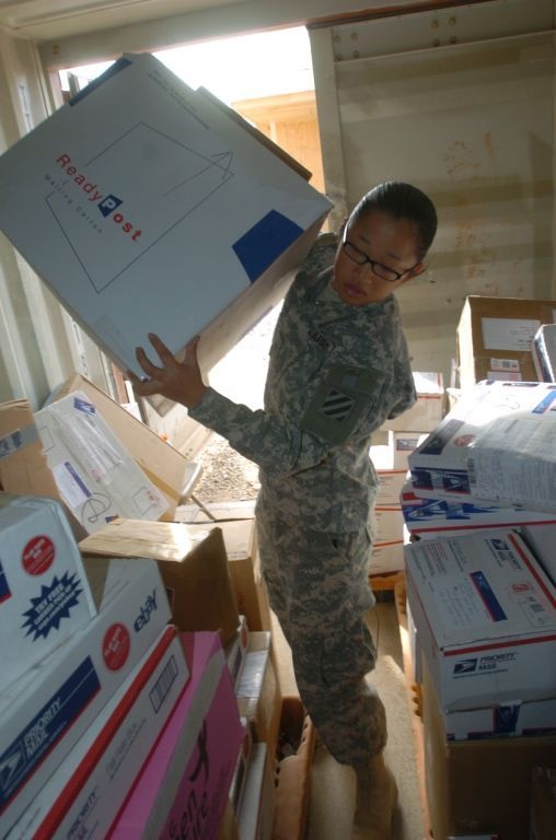 Mail handlers in overdrive to get Christmas packages to Soldiers
