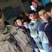 Iraqi Army, U.S. Troops Deliver Backpacks to School Children