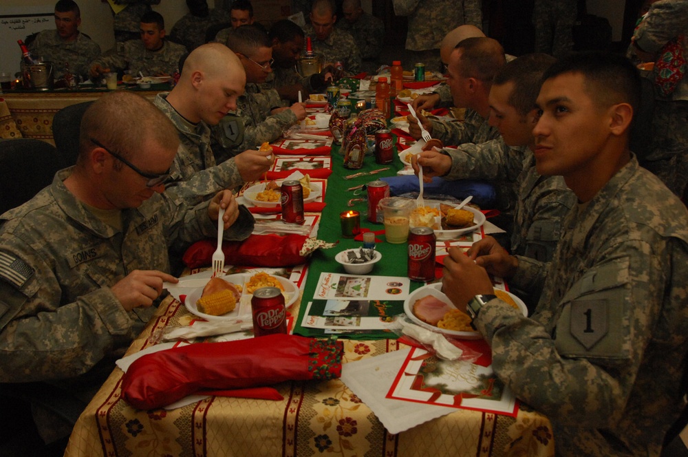 Troops celebrate Christmas with dinner, candlelight service
