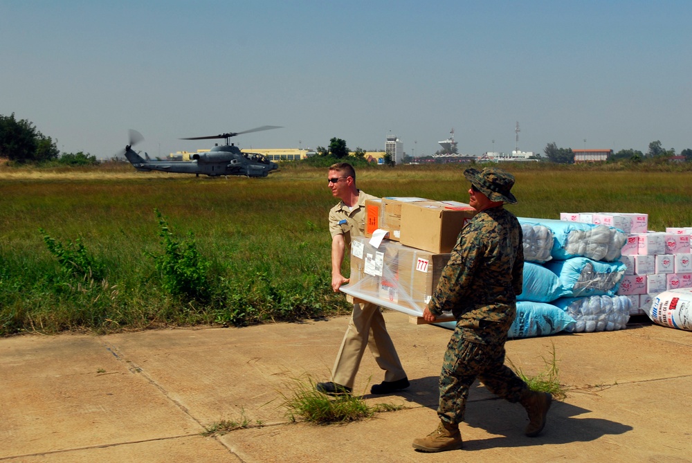 Carrying Supplies to waiting CH53E