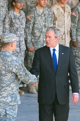 Bush visits troops in Kuwait