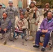 IA Soldiers distribute wheelchairs