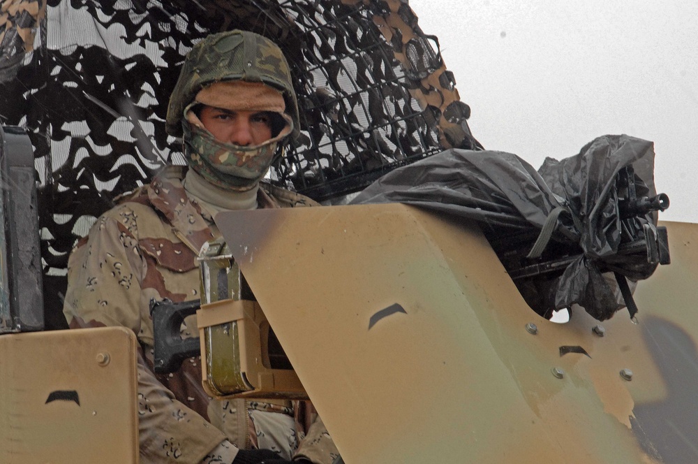 Iraqis stand up security forces in the northern DRV during Operation Raider