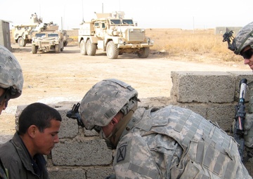 1-10th Mountain Soldiers Render Medical Aid to Injured Iraqi