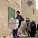 Soldiers distribute care packages to Iraqi civilians