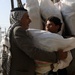 Soldiers distribute care packages to Iraqi civilians