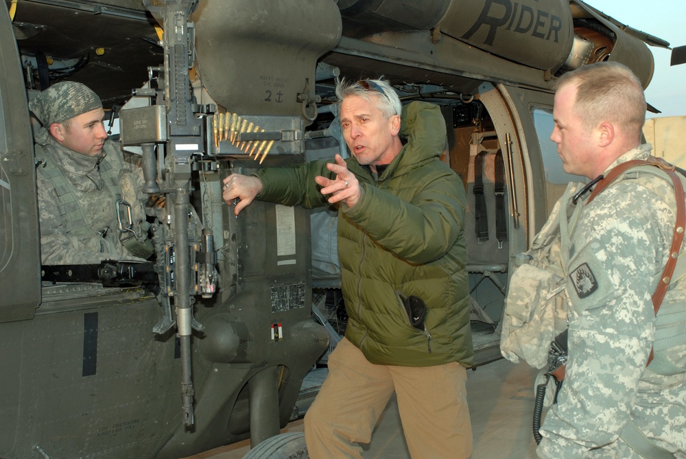 Artist begins production: Artist visits CAB Soldiers on Taji, LSA Anaconda