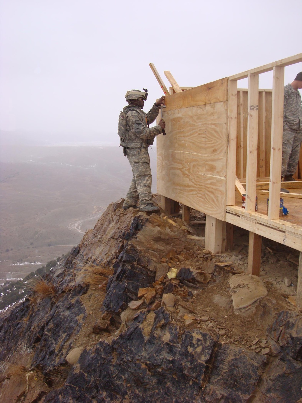 Soldier helps construct bunker