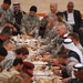 Rakkasans break bread with Qarghuli tribe