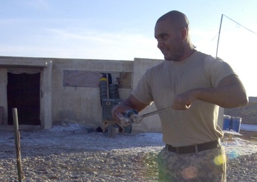 Soldier cooks up morale in Nawa