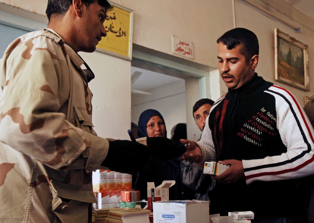 Iraqi and Coalition Troops Provide Free Health Care to Iraqi Citizens