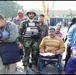 Iraqi Army Soldiers distribute wheelchairs in Schmook Village