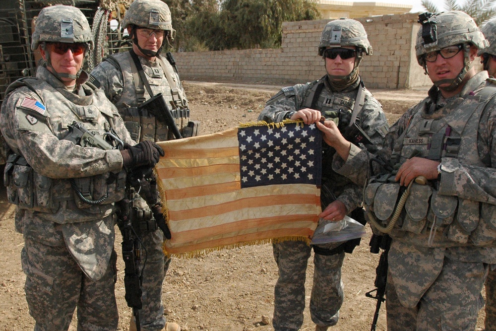Battle flag flies in Iraq again