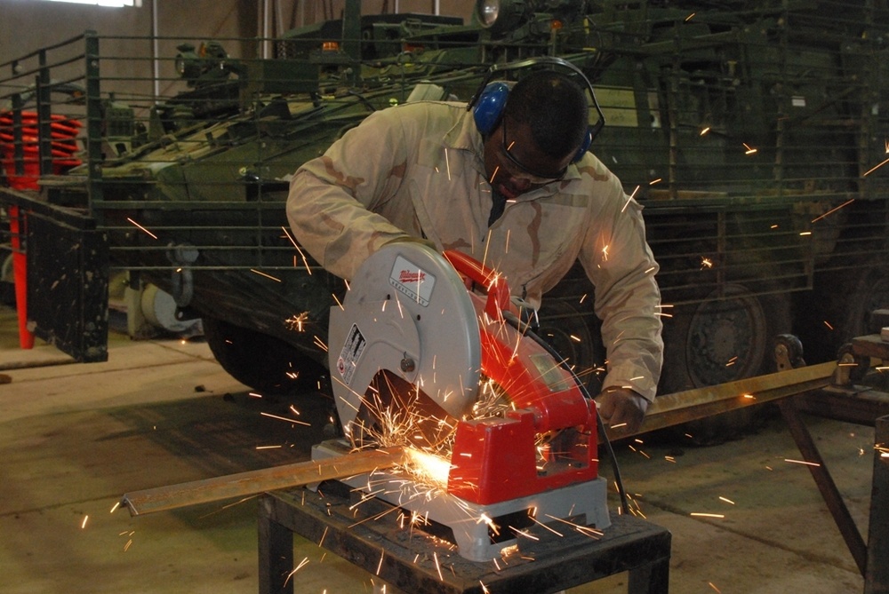 536th Maint. Co. Soldiers make security vehicles more secure