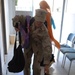 CJTF-HOA volunteers donate book bags with supplies to orphans