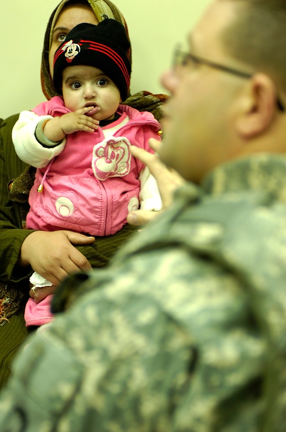 Troops connect Iraqis with government treatment program