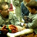 Troops connect Iraqis with government treatment program
