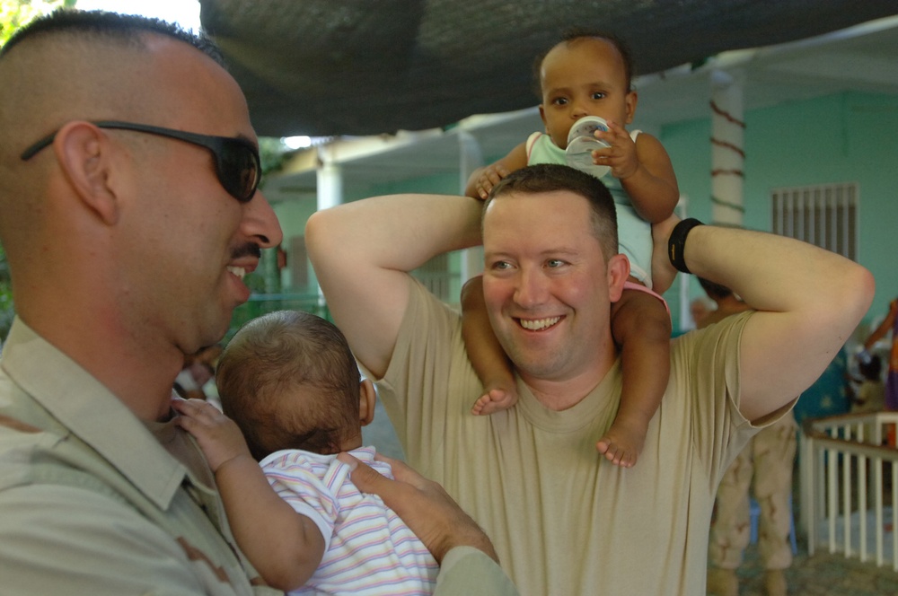Service Members Spend Special Time With Orphans