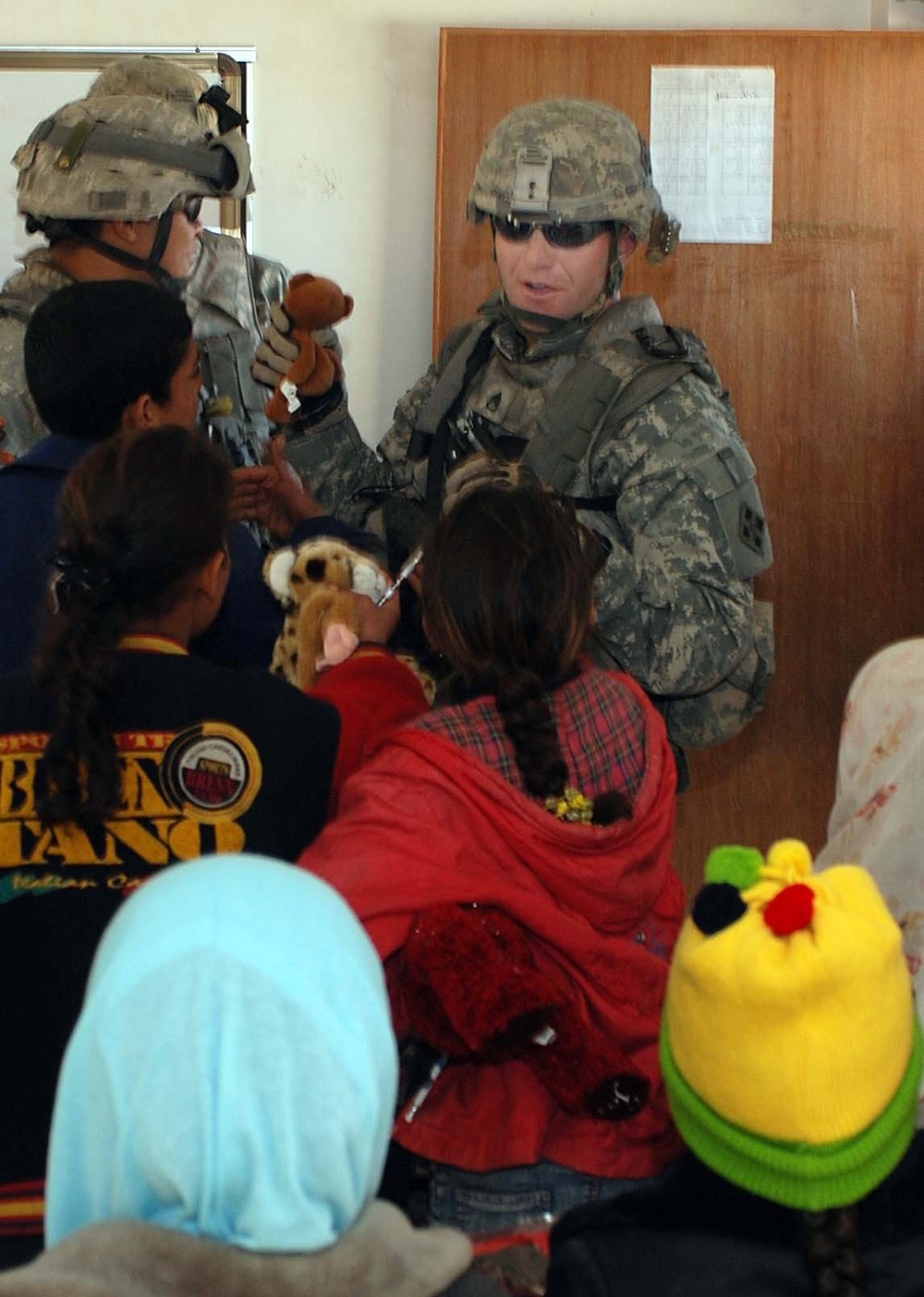 Soldiers Bring Gifts to Iraqi School Children