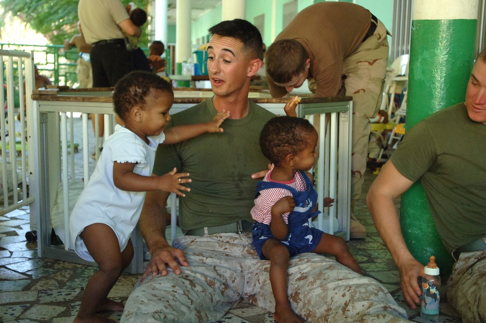 Service members Spend Special Time With Orphans