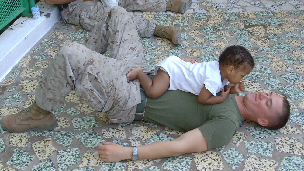 Service members Spend Special Time With Orphans