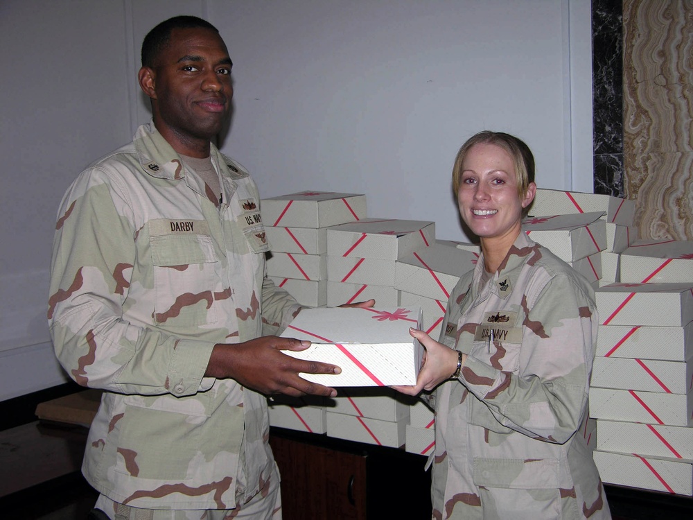 Holiday Donated Gift Boxes Are Handed Out