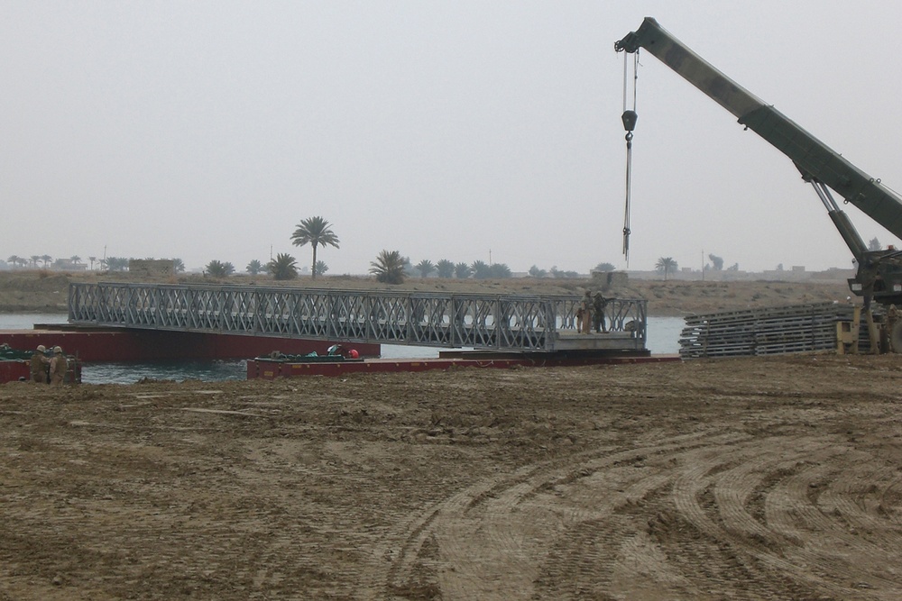 Army Engineers and Navy Seabees Work In Partnership On A New Bridge