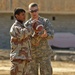 Iraqis, CF Soldiers work and play together