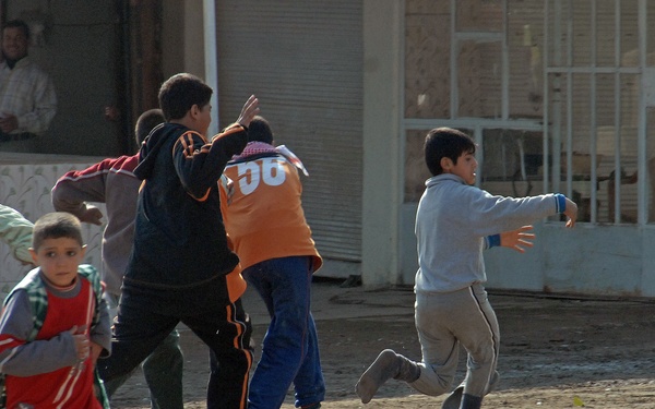 Boys play soccer in Diyala province