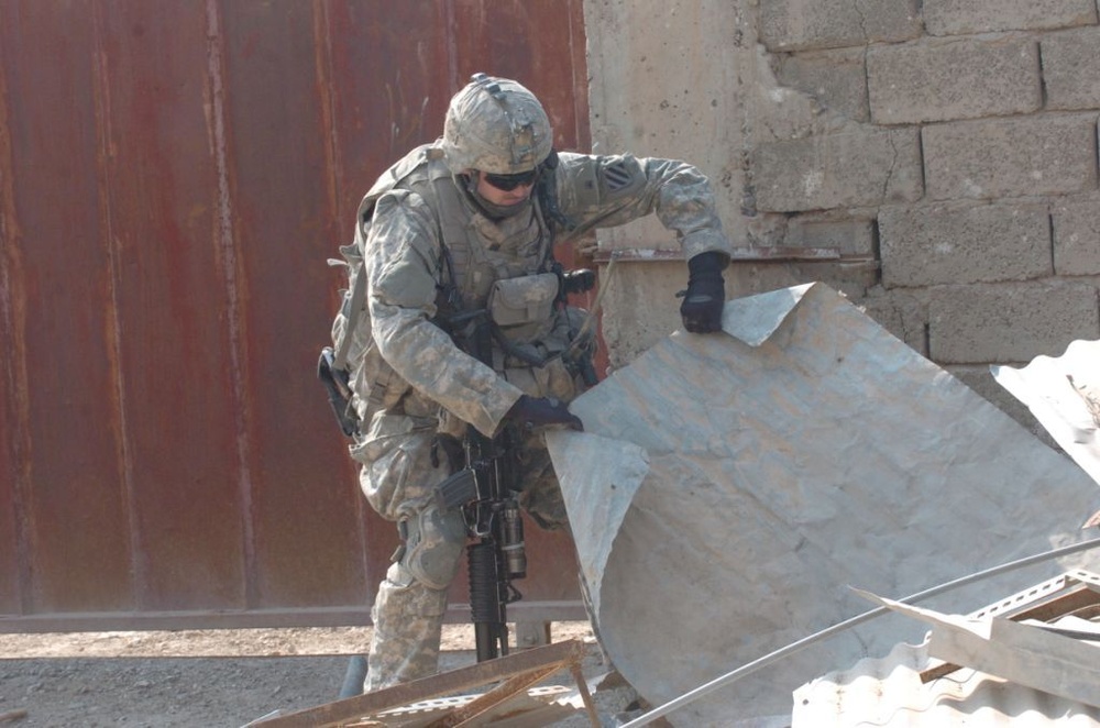 Company D, 1-15 Inf. Regt. hunts for caches