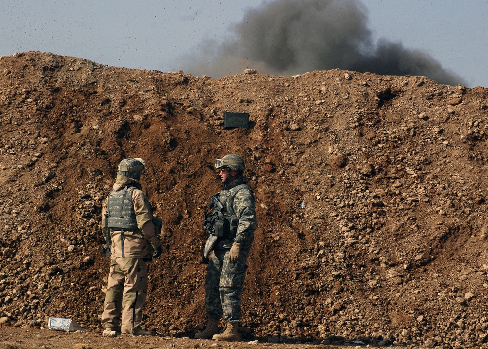 Sailors advise an Afghan garrison
