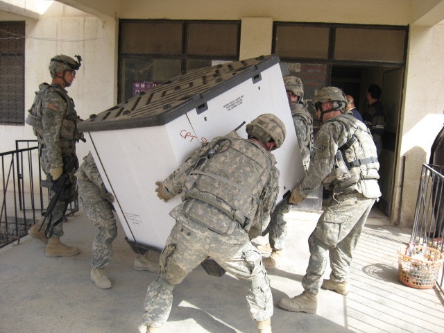 Cavalry troops delivery medical supplies