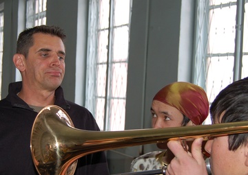 'Live Round' brings gifts, music to school for the deaf