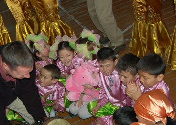 'Live Round' brings gifts, music to school for the deaf