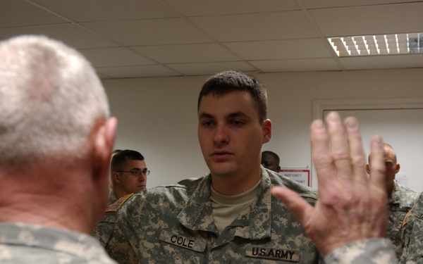 Soldier re-enlists in Kuwait